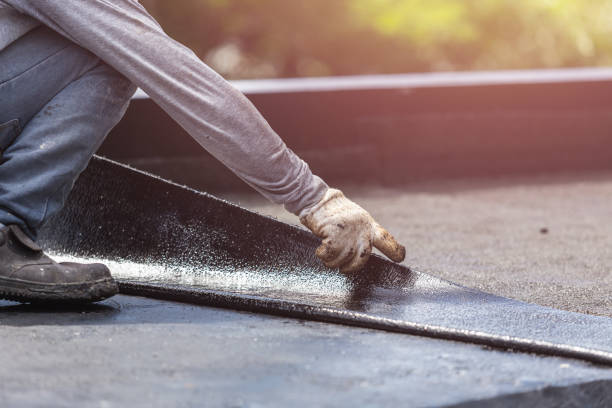 Professional Waterproofing technician working in Darlington, WI